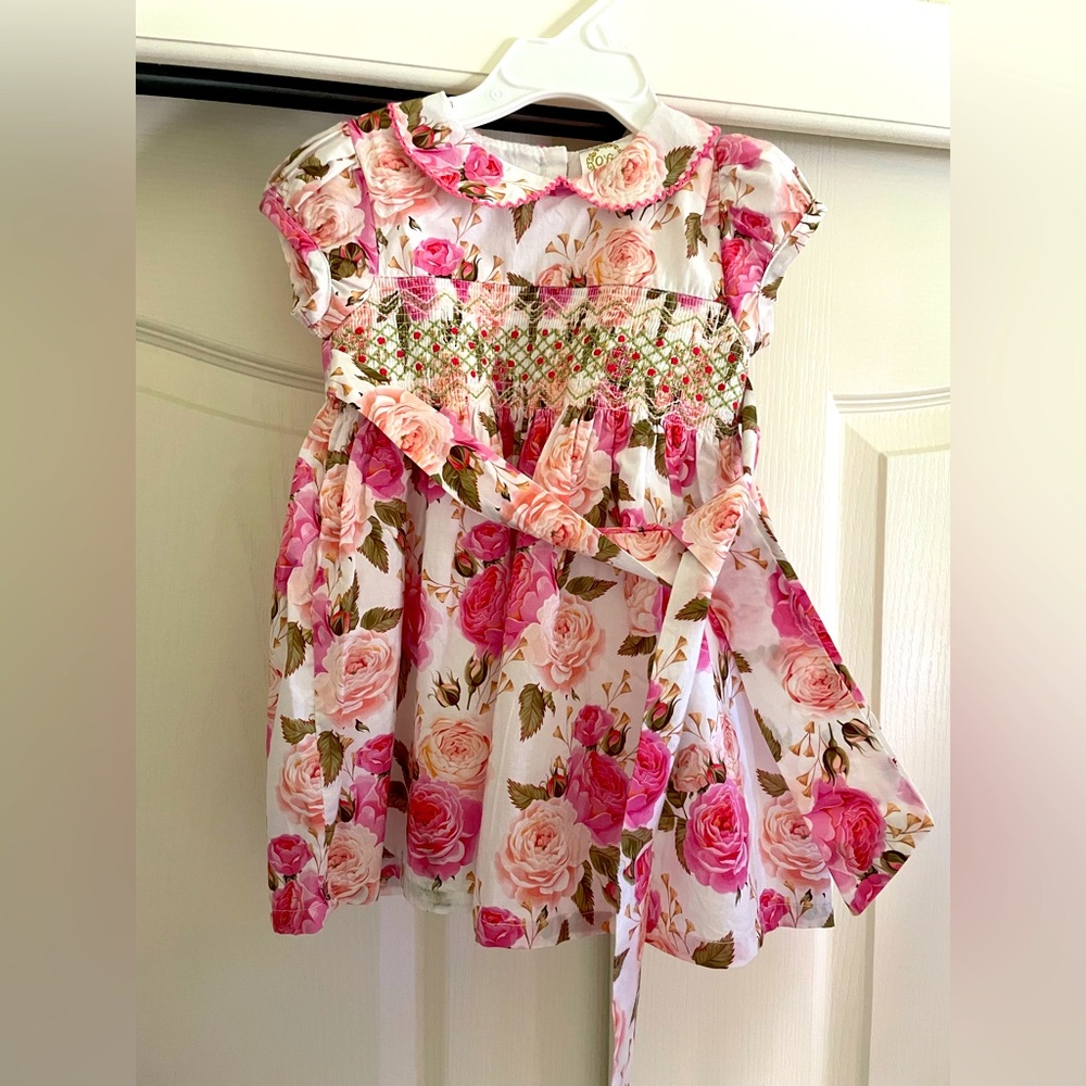 Brand new floral pink dress 12-18m with smock detail